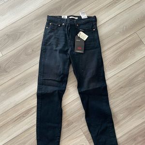 Levi jeans tapered leg 27 NWT